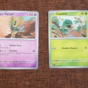 A set of 2 Pokemon cards, brand new, never used